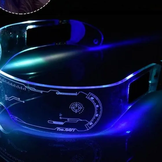 Clear futuristic visor glasses with etched circuit pattern glowing in multiple colors