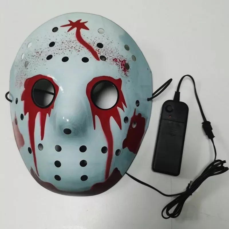 Weathered white hockey-style Halloween mask with red paint details and light kit