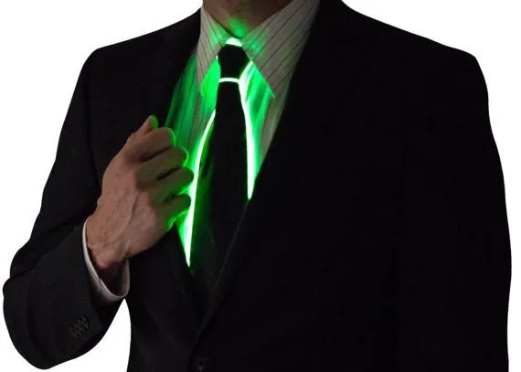 Black necktie outlined in glowing wire, worn with a suit